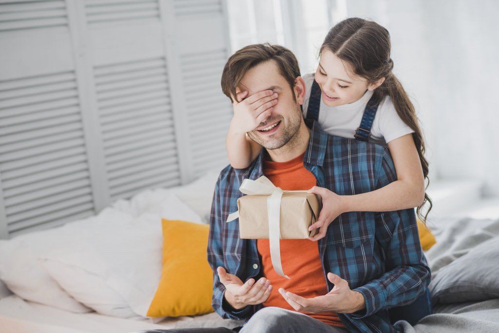 fathers-day-concept-with-daughter-covering-fathers-eyes.jpg